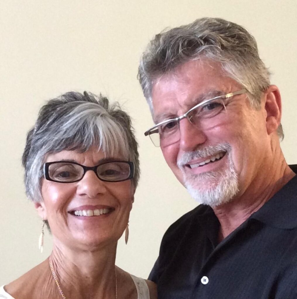 Bill and Diane smiling together before ALS diagnosis